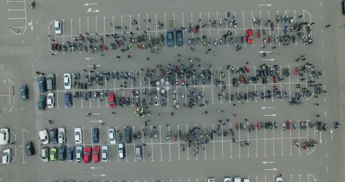 Party motorcyclists in the parking lot
