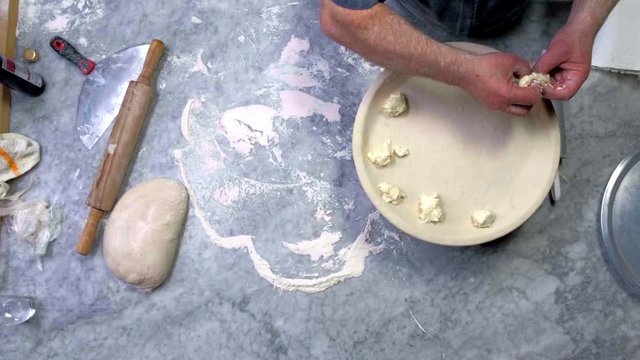 focaccia cheese preparation, dough detail