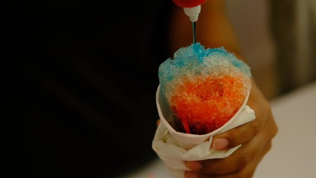 Snowcone Slow-motion Syrup Drizzle in slow  motion