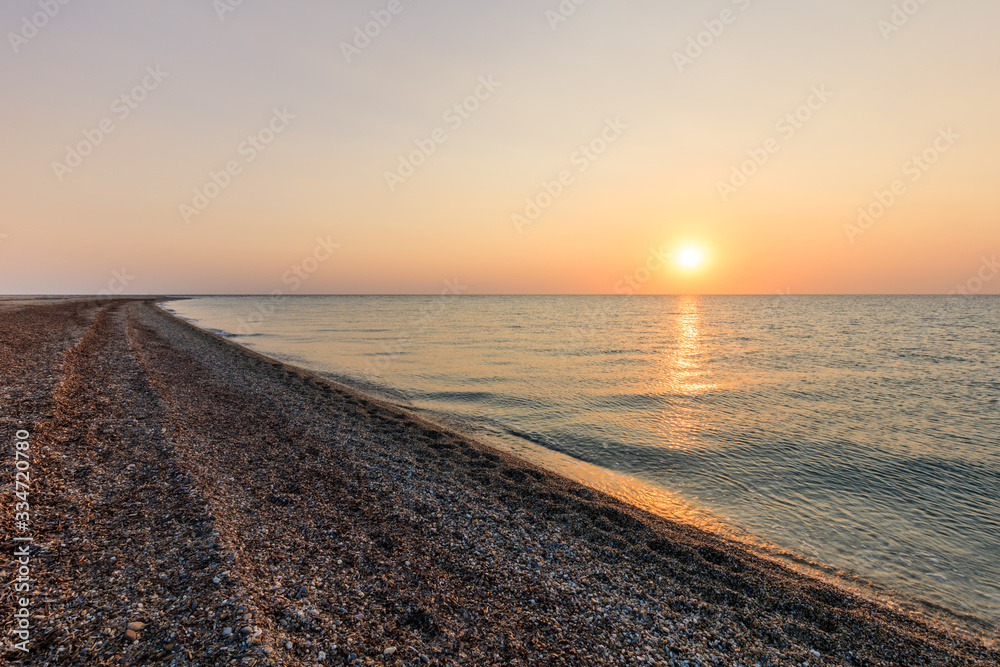 Poster sunset in possidi cape beach, greece