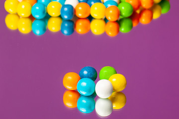 Colorful bubble gum spilling. Macro with shallow dof. Selective focus.