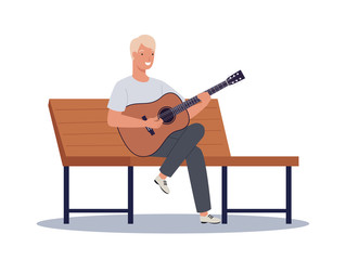 The young man sitting on bench and playing acoustic guitar.