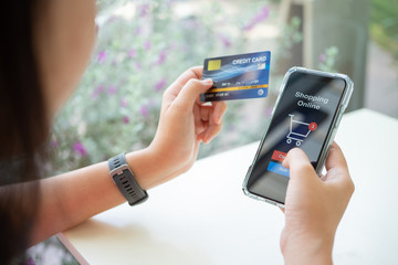 Online shopping with smartphone and shopping bags delivery service using as background shopping concept and delivery service concept with copy space  for your text or  design.