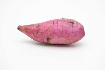 Raw purple daikon radish isolated on white background