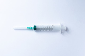 10 ml medical syringe for injection on a white background