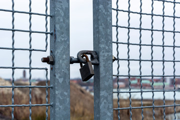 The gates are closed to the castle. netted gate