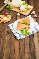 Traditional Russian food. Vegetarian dish. Cabbage pie. Homemade pie with cabbage. Russian cabbage pie. Russian cuisine.