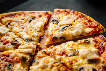  Appetizing marinara pizza with olives, side view, horizontal, closeup
