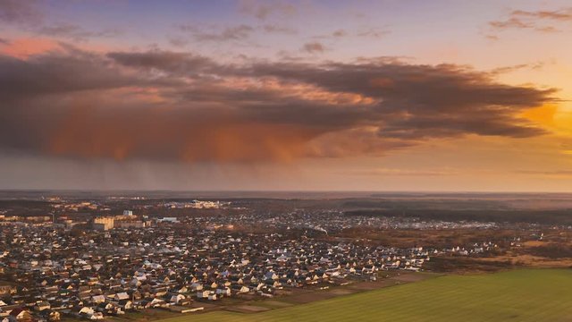 Dobrush, Gomel Region, Belarus. Aerial View Of Residential Area With Houses In Countryside. Sunny Autumn Evening. Sun Shining Above Town Skyline During Sunset. Hyperlapse