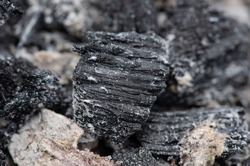 Abstract background texture of burnt ash. Coals in an extinct fire.