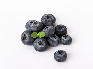 blueberries with mint isolated on a white background