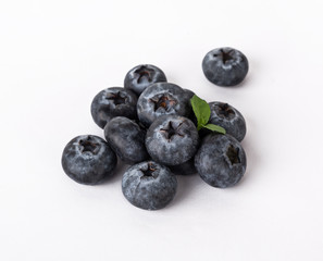 blueberries with mint isolated on a white background