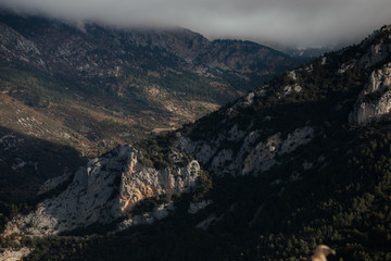 Rocky mountains at sunrise with fog and clouds in Catalan Pyrenees, Spain