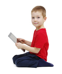 Boy using digital tablet