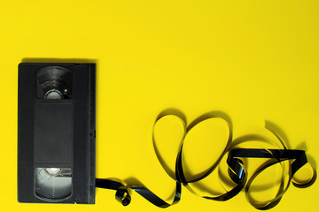 Cassette for a VCR  video recorder on a yellow background