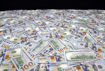 dollar banknotes isolated on black
