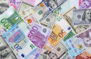 Fototapeta na wymiar dollar, euro and hryvnia banknotes