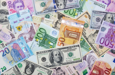 Fototapeta na wymiar dollar, euro and hryvnia banknotes