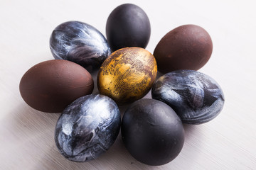 Holidays, design and modern easter concept - Black and brown easter eggs style minimalism