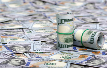  dollars in roll on money background