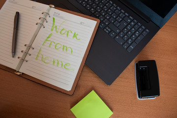 Top view of home office desk. Handwritten 