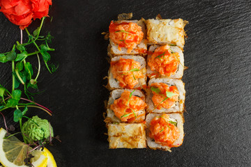 Japanese food: Set of salmon sushi and rolls with salmon and eel