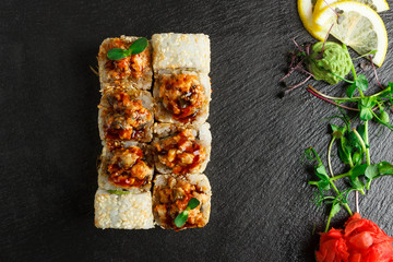 Japanese food: Set of salmon sushi and rolls with salmon and eel