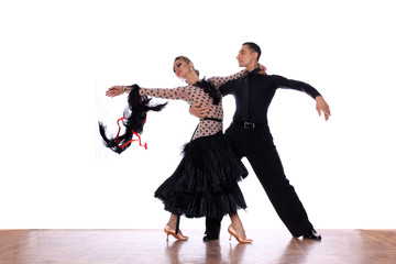 Dancers in ballroom against white background