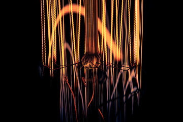 closeup of an incandescent lamp. Filament Retro Lamp Macro.