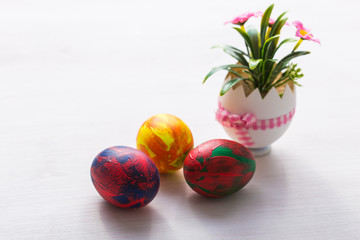 Holidays, traditions and Easter concept - Multi-colored decorative colourful eggs.