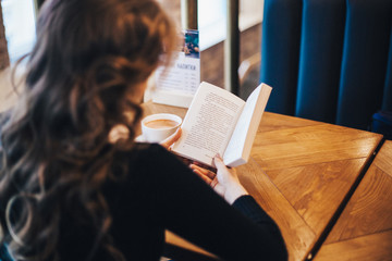 The girl in the cafe, a student or a Manager, meeting with friends in cafes, coffee, and coffee break