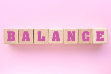 Lettering Balance on a pink background, balance in women's life
