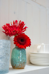 flowerdesign with red and white gerbera flowers 