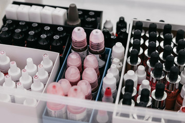 Cosmetologist tools, many jars with permanent