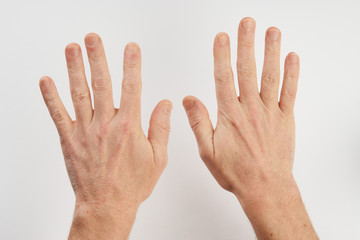 Man's clean hands isolated on white background with copy space.