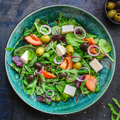 healthy salad olives, lettuce, tomato and cheese feta (greek salad, tasty vegetables snack) menu...