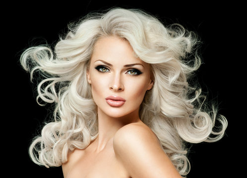 Long blond Hair.  Beauty Model Girl with Luxurious Hair.