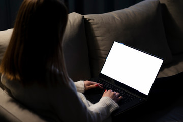 Naklejka premium High angle of woman holding a laptop