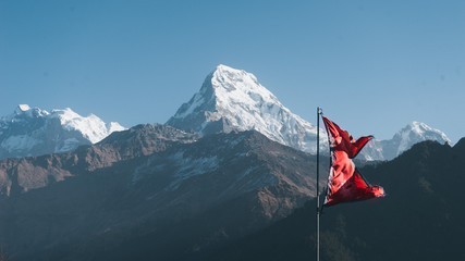 Nepal flag on the mountain - obrazy, fototapety, plakaty