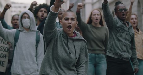 Activists protesting outdoors in the city - Powered by Adobe