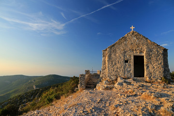 Fototapeta na wymiar Chapel on the top of Hum peak - the highest peak on Vis island, Croatia