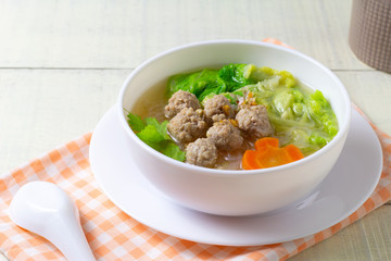 Clear glass noodle soup with Minced Pork and Vegetables (Gaeng Jued Woon Sen) © Kritchai