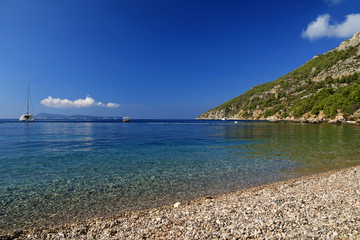 Obraz premium Coastline of Vis island in Komiza town, Croatia