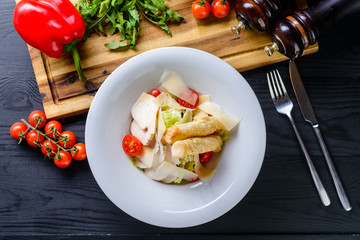 fresh salad of vegetables and chicken fillet