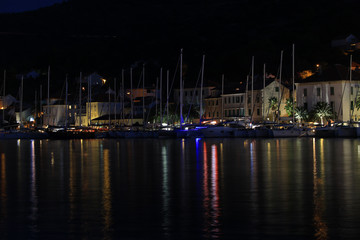 Fototapeta na wymiar Old Harbour in Vis town, Vis island, Croatia, by night