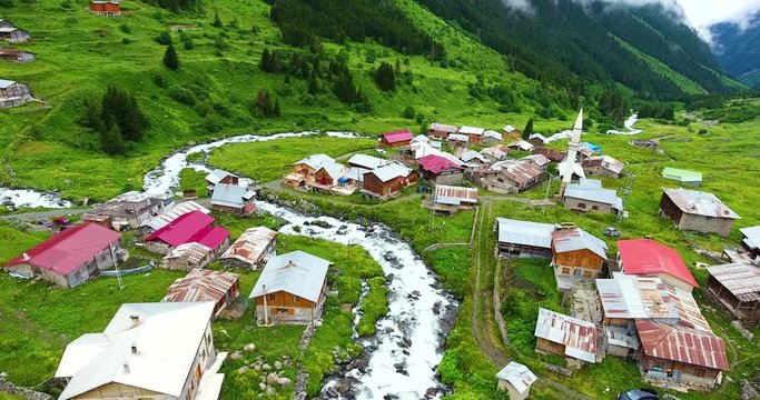  aerial view of a mountain village in the heart of nature