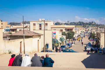 Asmara, Eritrea - November 01, 2019:  Old Buildings and Cars around of Local Market