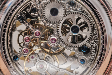Fototapeta na wymiar pocket watch gears, 6 rubies