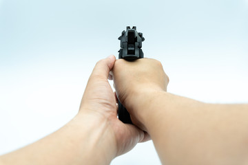 Model gun shot on white background