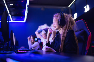 Team professional gamer playing winning tournaments online games computer © Parilov